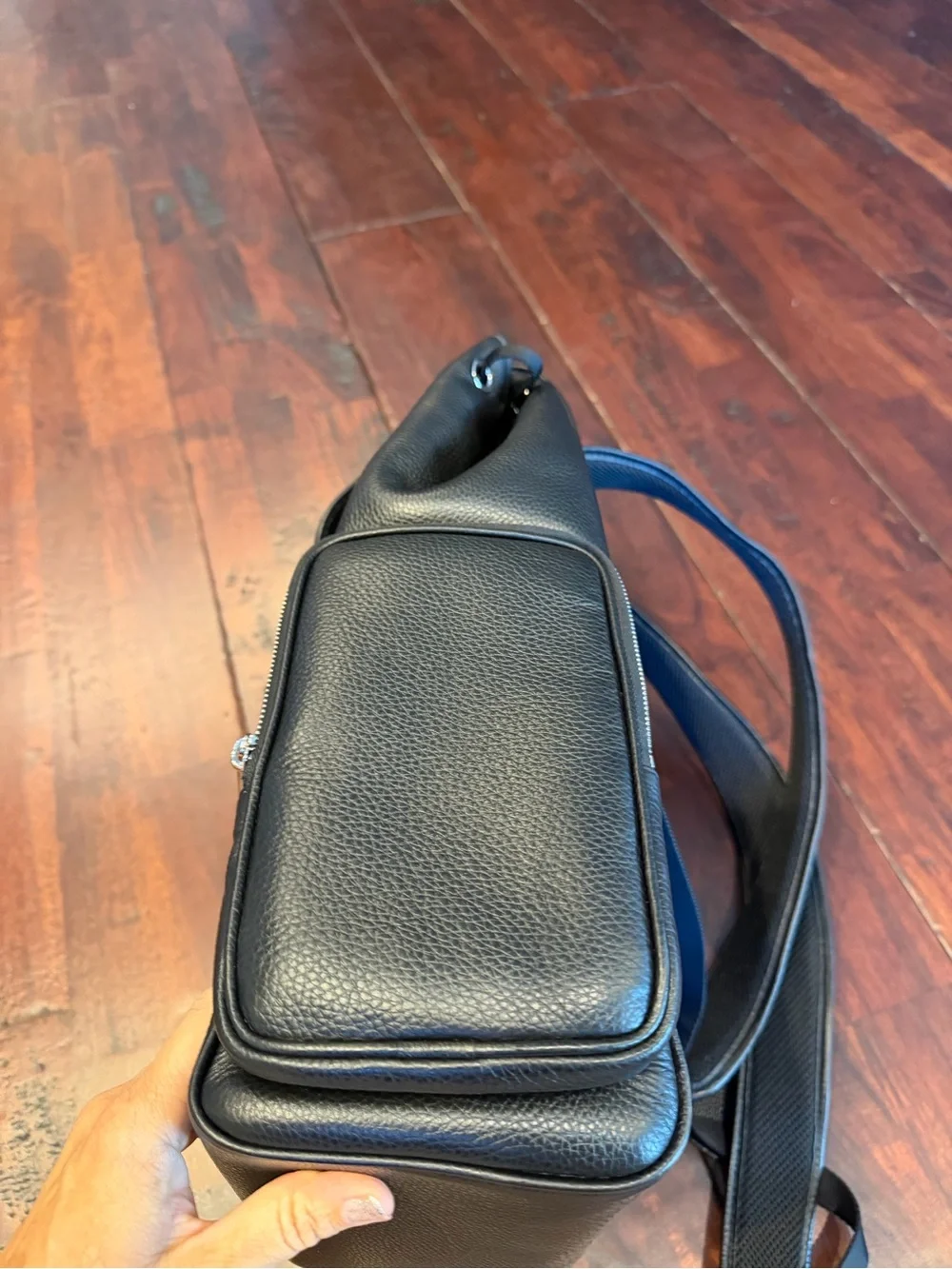 RIMOWA Black Leather Men's Backpack with Front Flap, used only once.